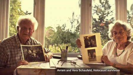 Holocaust survivors, Avram and Vera Schaufeld, who have been married for over 60 years photographed in their living room. Avram holds a photo of his mother's family. All except one uncle were killed in World War 2.   Vera holds two photographs, one of her as a child as she was put on a boat to England, a journey she doesn't remember. The other is a photo of her parents and grandmother, the last that was taken before they were killed.