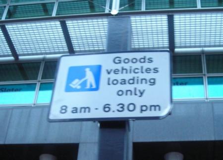 Goods vehicles loading only sign, the sign has a picture of loading/unloading symbol and states ‘Goods vehicles loading only 8am – 6.30pm’