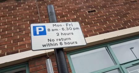 Maximum stay sign states ‘Mon – Fri 8am – 6.30pm 2 hours No return within 6 hours