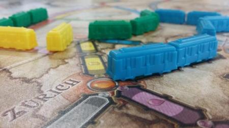 close up of small trains on board games