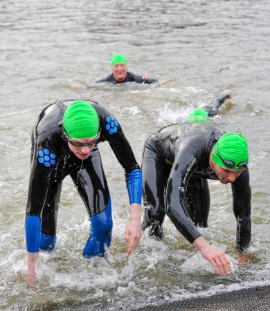 Swimmers emerge from the water at Leazes Park