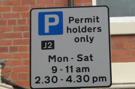 Sign taken from permit scheme advises, ‘Permit holders only Mon – Sat 9-11am 2.30-4.30pm)