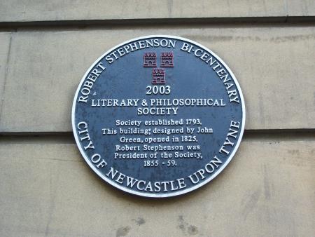 A commemorative blue plaque in newcastle