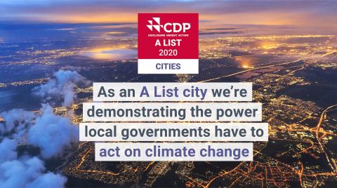 Aerial shot of a city with text about Newcastle being named on the CDP A List 2020