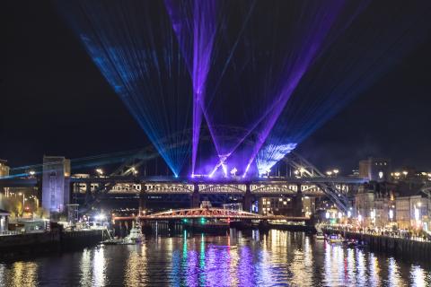 The Tyne Bridge lit with lasers