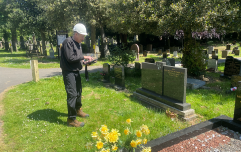 Staff inspecting gravestones in Jesmond Old Cemetery