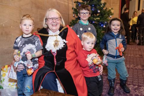 Deputy Lord Mayor of Newcastle, Cllr Veronica Dunn, and Ukrainian children at the party
