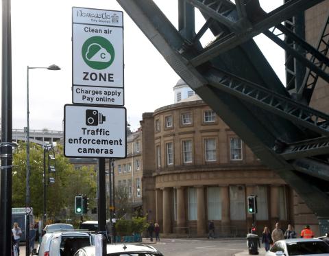 Photo shows Clean Air Zone road signage on the Quayside under the Tyne Bridge.