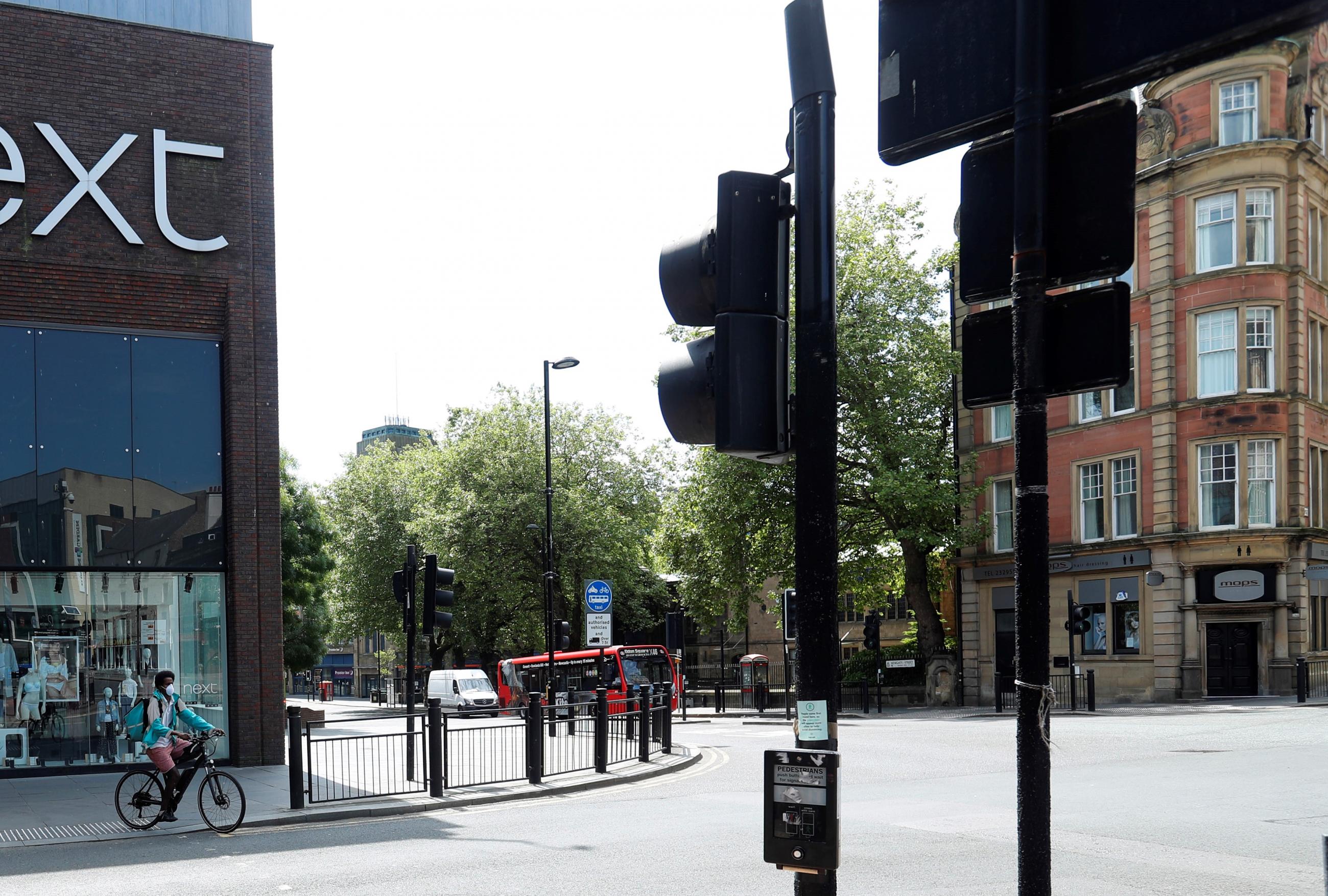 Photos shows a view of Newgate Street looking across the junction from the corner of Blackett Street.