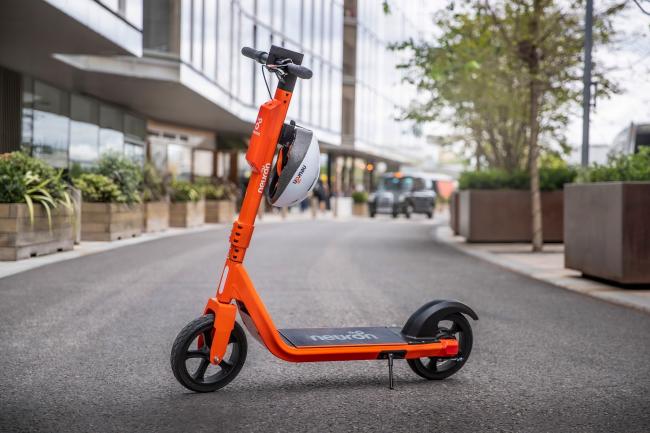 Photo of an orange e-scooter