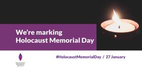 Lit candle with words we are marking Holocaust Memorial Day
