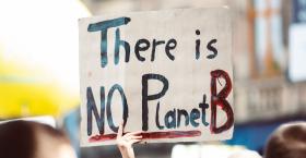 Protest sign with There is no Planet B written on it