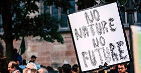 A protest sign declaring No Nature No Future