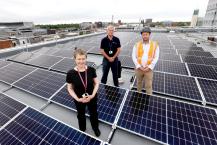 Cllr Jane Byrne, Newcastle City Council’s Connected City Cabinet member, with Tim Wood, Director of Sustainability & Innovation at EQUANS and Joe Logan, Construction Manager at EQUANS on the roof of City Library